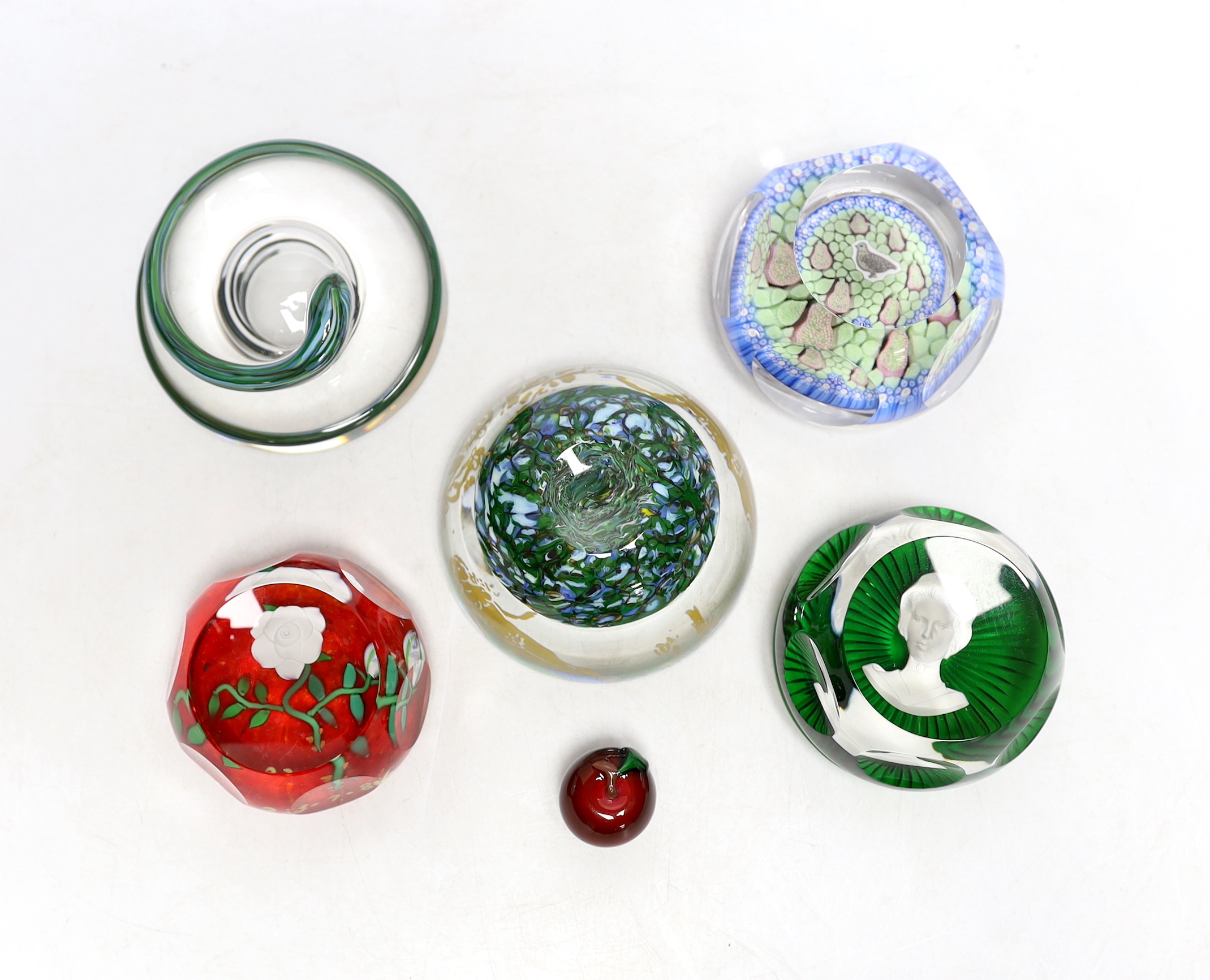 Four boxed paperweights including St Louis Adam & Eve, Baccarat sulphide, Perthshire etc.